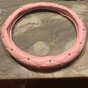Vegan leather steering wheel cover in light pink